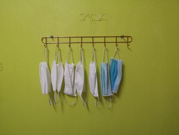 Clothes drying on clothesline against wall