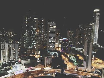 Illuminated cityscape at night