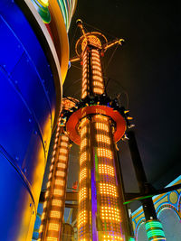 Low angle view of illuminated buildings at night