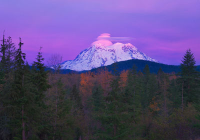 Scenic view of mountains against sky during winter
