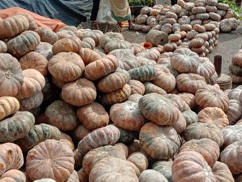 Low section of person for sale at market stall