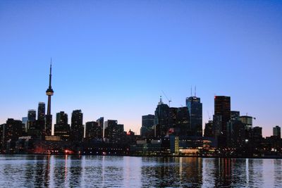 City lit up at dusk