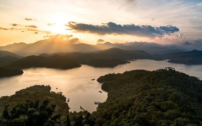 Scenic view of mountains against sky during sunset