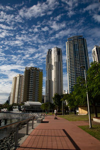 Modern buildings in city against sky