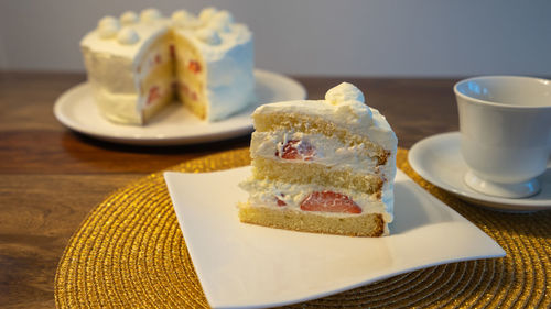 High angle view of cake and coffee on table