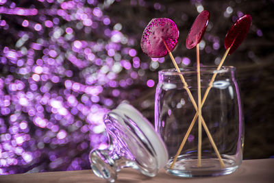 Close-up of glass jar on table