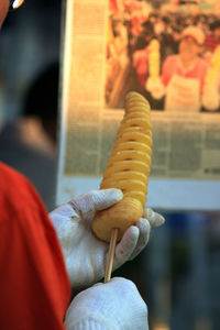 Close-up of man holding ice cream