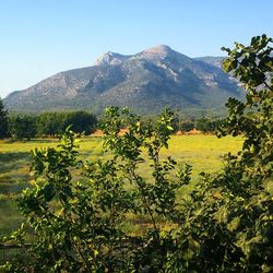 Scenic view of mountains against clear sky