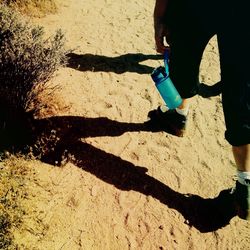 Shadow of woman standing on floor