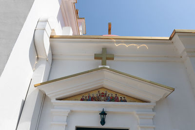 Low angle view of white building against clear sky