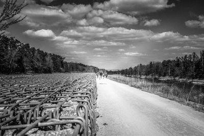 Surface level of road against sky in city