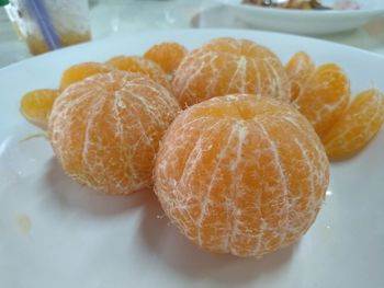 Close-up of orange slices on table