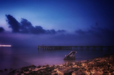 Scenic view of sea against sky at sunset
