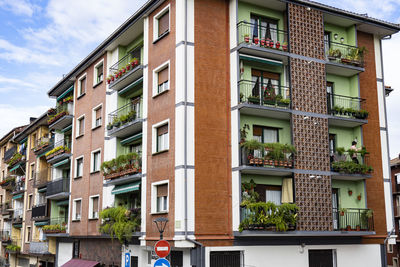 Low angle view of residential building against sky