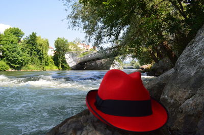 Red rock by sea