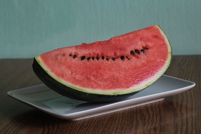 High angle view of fruits in plate on table