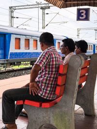 Men sitting outdoors