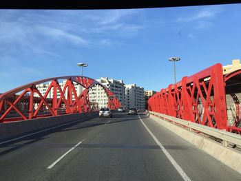 View of bridge against sky in city