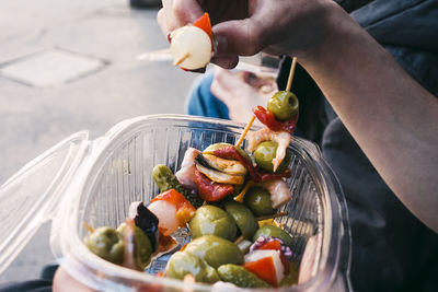 Midsection of person preparing food