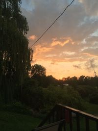 Scenic view of landscape against cloudy sky