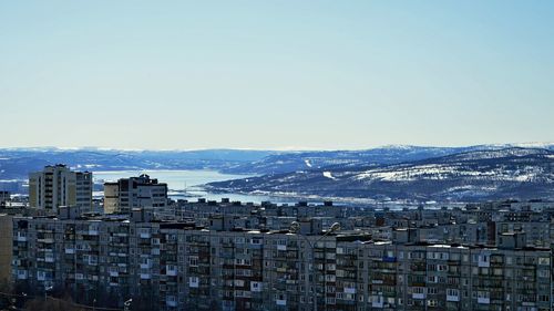 View of cityscape against clear sky