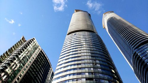 Low angle view of skyscrapers against sky