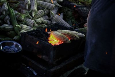 High angle view of meat on barbecue grill