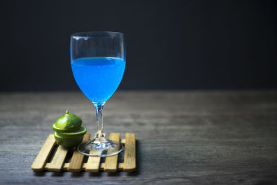 Close-up of wine glass on table