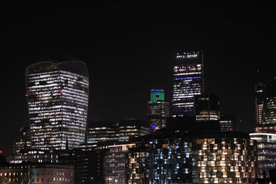 Skyscrapers in city at night