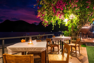 Empty chairs and tables in restaurant