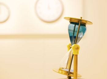 Close-up of hourglass on table