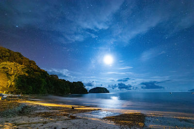 Scenic view of sea against sky at night