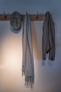 Close-up of clothes hanging on wall