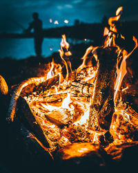 Close-up of fire in water at night