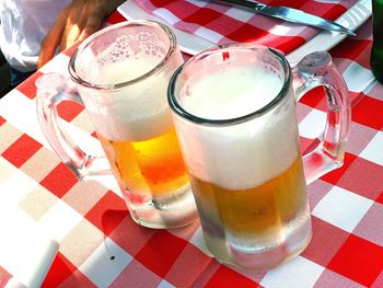 High angle view of beer glass on table