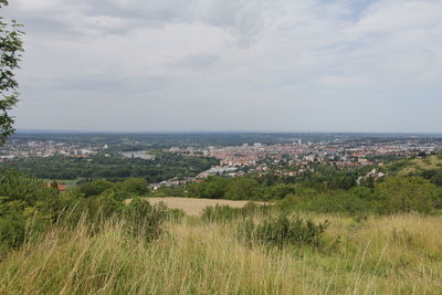 Scenic shot of landscape against cloudy sky