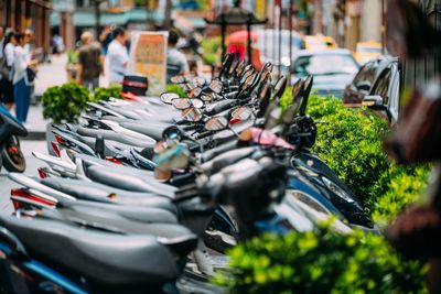 Close-up of bicycles in parking lot