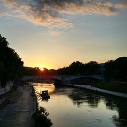 Scenic view of sunset over river