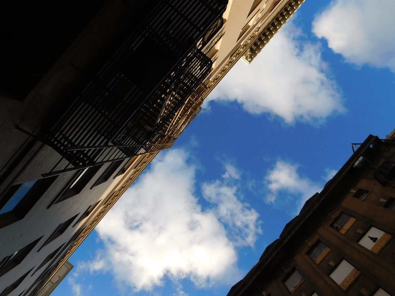 low angle view, architecture, building exterior, sky, built structure, cloud - sky, day, no people, outdoors, nature