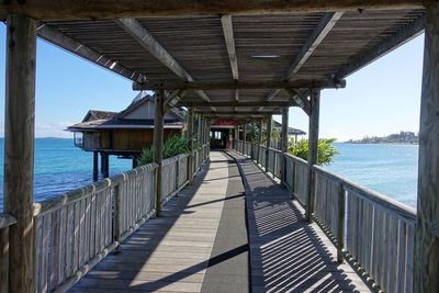 Pier over sea against sky