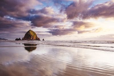 Scenic view of sea against sky during sunset