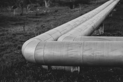 Close-up of pipe on field