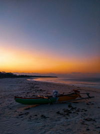 Scenic view of sea against clear sky during sunset