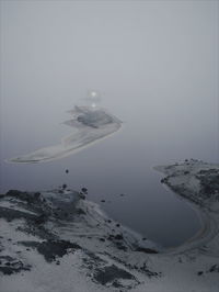 Scenic view of sea against sky during winter