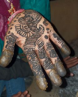 Close-up of woman hand with tattoo