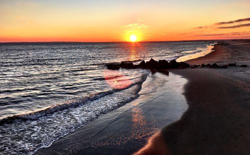 Scenic view of sea at sunset