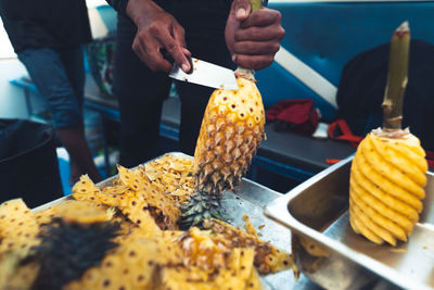 Midsection of person preparing food