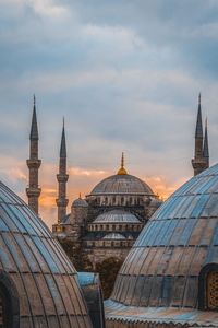 Low angle view of mosque against sky