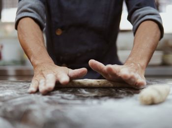 Close-up of person preparing food