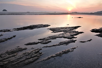 Scenic view of sea against sky during sunset